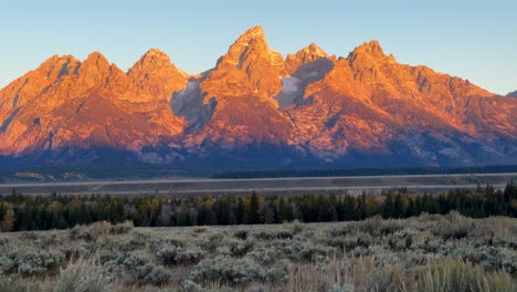 Grand-Teton-National-Park-HDR-first-light-morning-sunrise-sunset-pink-red-peaks-Jackson-Hole-Wyoming-Willow-Elk-Ranch-Flats-Photographer-dream-beautiful-cinematic-slider-left-motion-zoomed-in