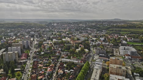 Kutna-Hora-Czechia-Aerial-v3-flyover-Hlouska-neighborhood-towards-town-center-capturing-charming-historical-townscape-and-hillside-landscape-on-a-sunny-day---Shot-with-Mavic-3-Cine---November-2022