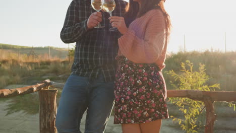 Beautiful-couple-tasting-wine-on-a-pontoon