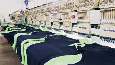 T-shirts-on-sewing-machine-in-a-fabric-factory