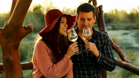 Couple-having-a-romantic-moment,-tasting-some-wine