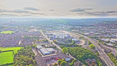 Wide-angle-establishing-drone-shot-Leeds-city-and-suburbs-in-England