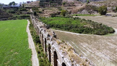 Aerial-view-of-Ancient-Turkish-water-aqueduct-system-on-a-bright-summer-day