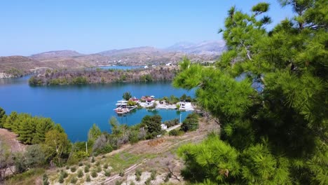 Aerial-sunny-Turkish-landscape-of-Oymapinar-bright-lake-in-Manavgat,-Turkey