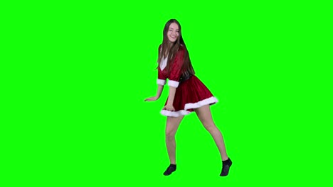 Hermosa-Y-Enérgica-Bailarina-Actuando-Frente-A-Una-Pantalla-Verde-Vestida-Con-Un-Disfraz-Navideño-De-Papá-Noel.