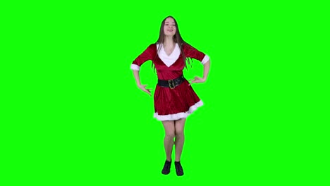 Stunning-female-Santa-Claus-dancing-in-front-of-a-green-screen-wearing-a-dress
