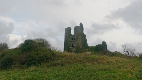 Ruined-Castle-romantic-ruins-on-a-cold-winter-day-at-Dunhill-Castle-Waterford-Ireland-on-a-bleak-mid-winter-day