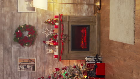 Vertical-video:-Zoom-in-shot-of-fireplace-burning-in-a-room