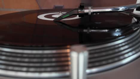 Close-up-of-a-music-vinyl-on-a-turntable-being-played