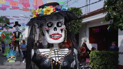 Medium-close-up-of-skeleton-woman-statue-for-Day-of-the-Dead-festival