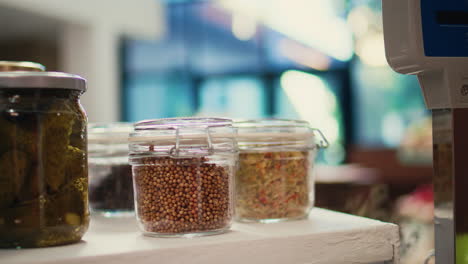 Grains-and-pasta-as-bulk-products-in-glass-jars-at-checkout