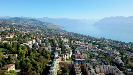 Overfly-Lausanne-City-Towards-The-East-Of-Vaud-Canton-In-Lake-Geneva,-Switzerland