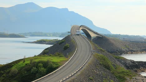 Caravan-car-RV-travels-on-the-highway-Atlantic-Ocean-Road-Norway.