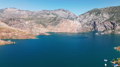 Aerial-pullback-reveals-mystic-Green-canyon,-Taurus-mountains-Turkey