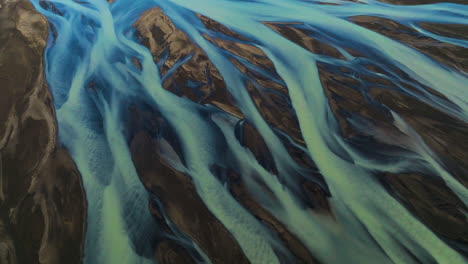 Kalfafell-River-Braids,-Iceland---An-Up-close-Observation-of-a-River---Orbit-Drone-Shot
