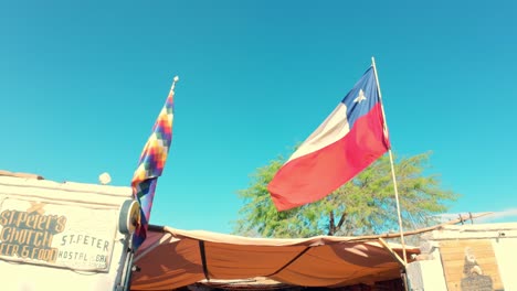 Two-Flags-In-The-City-Center-Of-San-Pedro-de-Atacama
