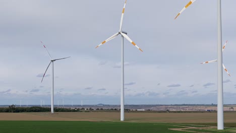 Wind-turbine-farm-in-European-Germany,-green-energy-environmental-friendly-in-Europa