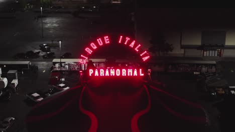 Red-LED-Light-Sign-Of-Paranormal-Cirque-Italia-At-Night