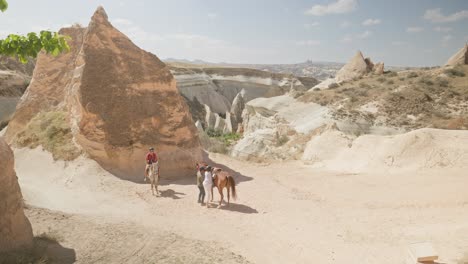 Tourism-horseback-rides-stunning-rocky-landscape-Rose-Red-Valley-trails