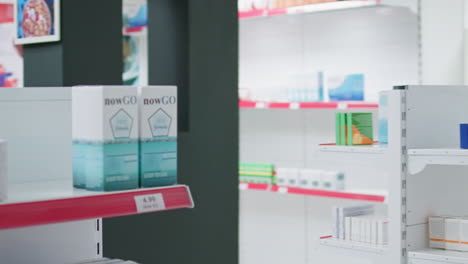 Boxes-of-prescribed-medicine-displayed-in-empty-drugstore
