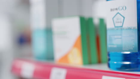 Selective-focus-of-pills-boxes-and-bottles-on-drugstore-shelves