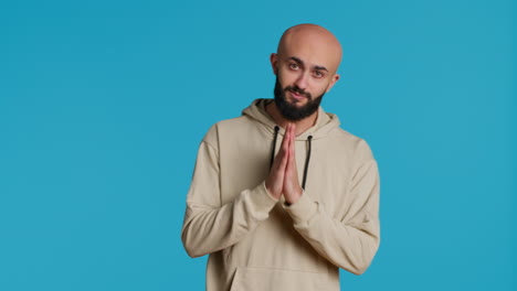 Middle-eastern-man-praying-to-Allah-for-forgiveness