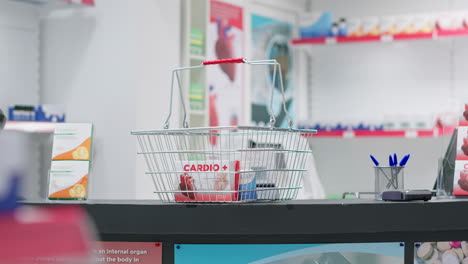 Empty-pharmacy-checkout-counter-with-boxes-of-medicine