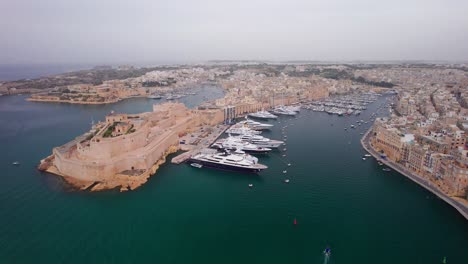 Aerial-Landscape-of-The-Three-Cities-and-Fort-St-Angelo-in-Malta