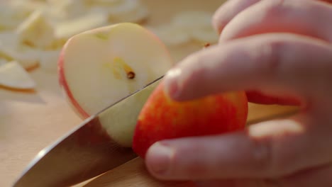 Dicing-an-Apple-with-a-Large-Knife-on-Cutting-Board