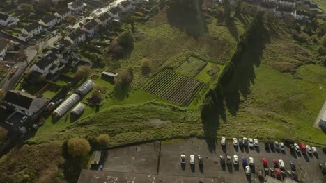 Aerial-shot-of-a-vegetable-garden-revealing-surroundings