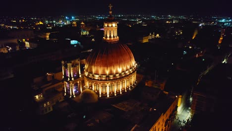 Close-Aerial-of-Dome-of-Basilica-of-Our-Lady-at-Night-Time,-Valleta,-Malta