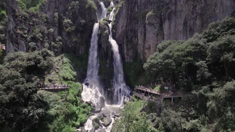 Touristic-Waterfall-attraction:-Aerial-Drone-View-of-Nature's-Splendor-in-Puebla,-Mexico