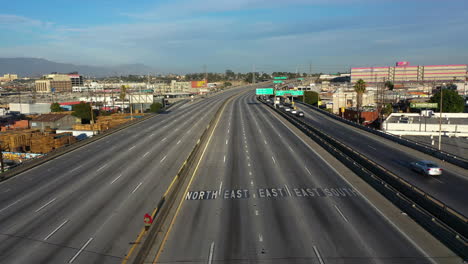 Aerial-view-over-the-closed-Interstate10,-following-cars-drive-on-a-detor-in-LA