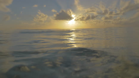Viewing-sunset-from-the-sea-water-surface