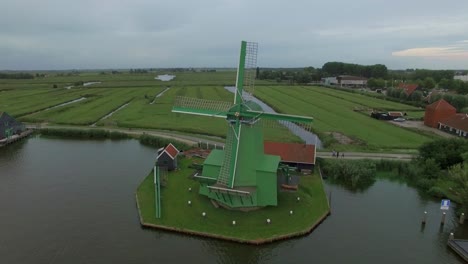 Aerial-shot-of-old-windmills-and-fields-in-Netherlands