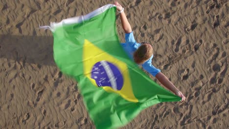 Aerial-view-of-woman-with-Brazilian-flag-and-nature-scene