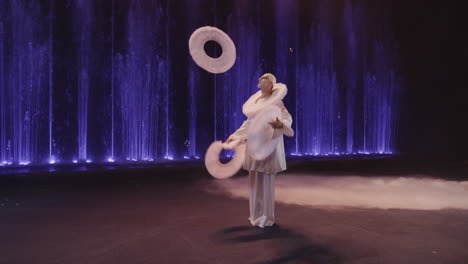 Circus-performer-juggling-rings