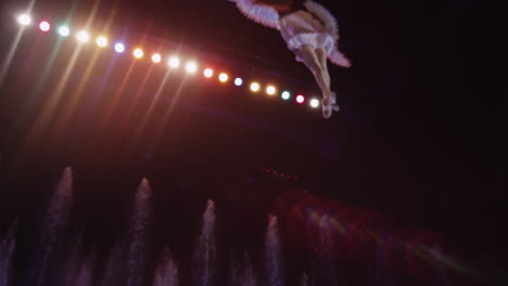 Aerial-performance-of-woman-gymnast-in-the-circus