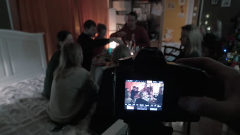 Shooting-video-of-friends-meeting-at-home