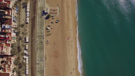 Aerial-top-view-of-beach-sea-railways-and-hotels-Barcelona-Spain