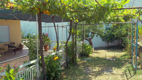 Two-Swings-on-the-House-Backyard