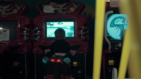 Child-playing-on-racing-simulator