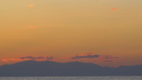 Evening-landscape-with-sky-mountains-and-sea