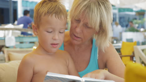 Child-with-grandmother-and-book