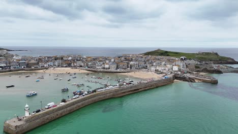 Pull-back-drone-aerial-reverse-reveal-St-Ives-Cornwall-UK-drone-,-aerial-,-view-from-air