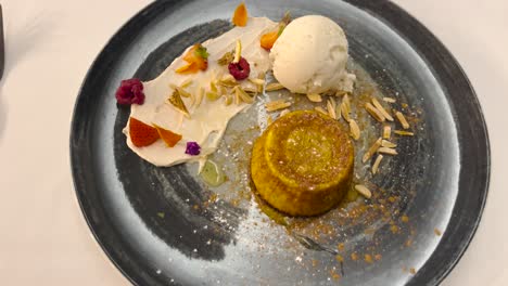 Cake-and-ice-cream-dessert-on-a-plate-in-restaurant