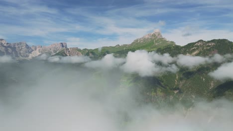 Sass-de-Putia:-Aerial-exploration-over-majestic-mountain-peaks-and-roads