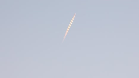 Shot-Of-Military-Fighter-Trail-Under-Blue-Sky
