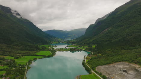 Scenic-panoramic-aerial-view-down-valley-of-Oldevatnet-Lake,-Stryn,-Norway