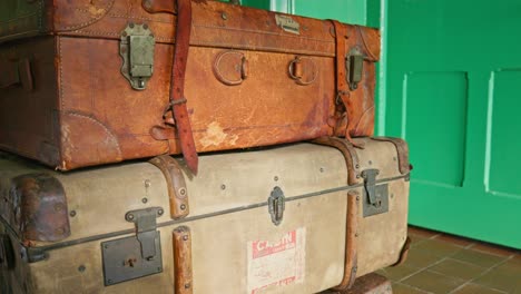 Retro-luggage-travel-suitcases-Vintage-railway-station-office-close-up